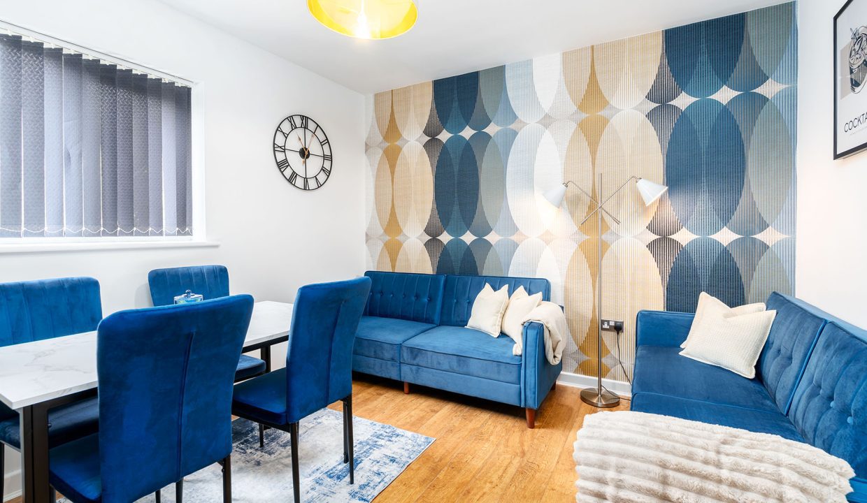 spacious-living-room-with-sofas-comfy-stays-for-you